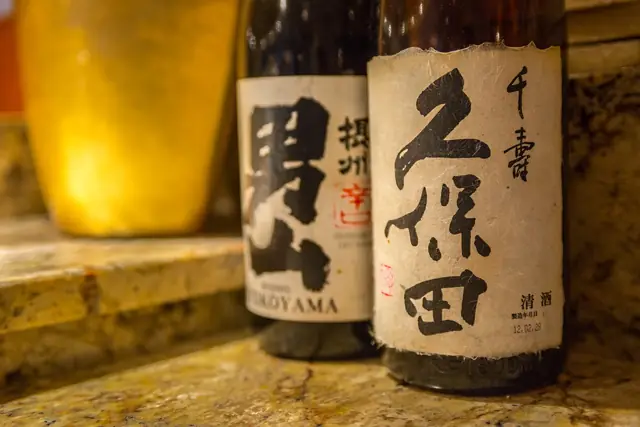 Bottles of Japanese sake on the bar