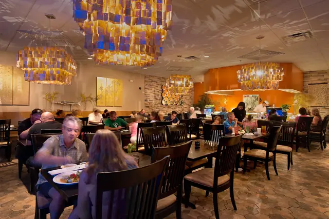 Dining room with chandeliers and tables